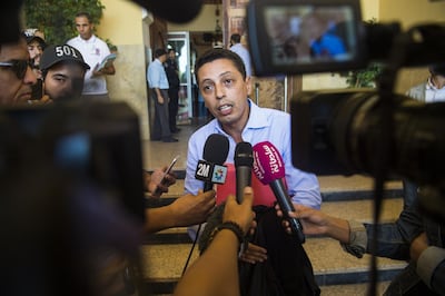 Youssef Chehbi, one of the lawyers of Moroccan teenager Khadija, speaks to journalists outside the courthouse of the Moroccan city of Beni Mellal, after his client's court hearing on October 10, 2018. The 17-year-old Khadija who has accused several men from her village of gang-rape, maintained her accusations today before an investigating judge, despite insults and threats from her detractors, her father said. / AFP / FADEL SENNA
