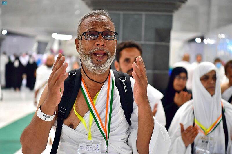 Pilgrims offer prayers. SPA