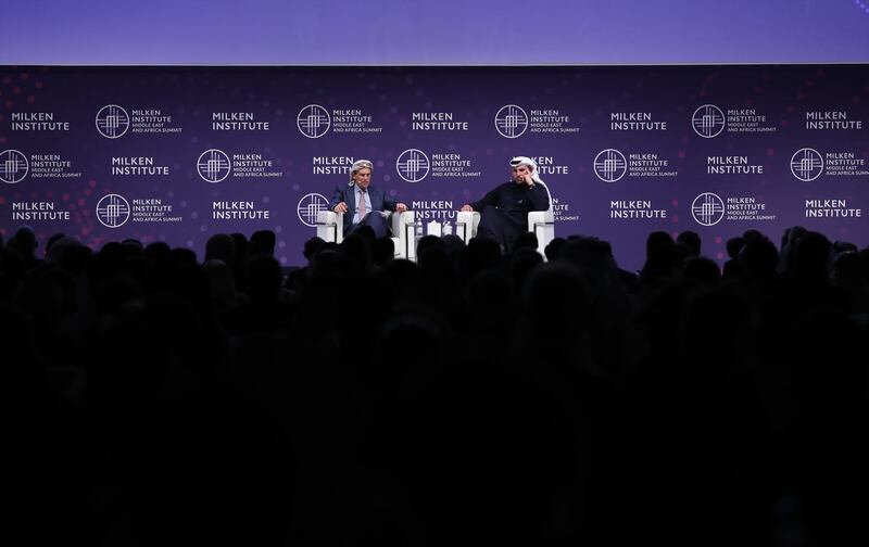 Michael Milken, Chairman of the Milken Institute, and Khaldoon Al Mubarak, right, chief executive of Mubadala Investment Company, speak during the 2020 Milken Institute Middle East and Africa Summit at St Regis Saadiyat Island Resort in Abu Dhabi.  EPA