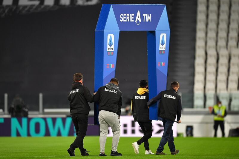 The Serie A arch is carried away by stewards after Napoli's no show. Getty Images