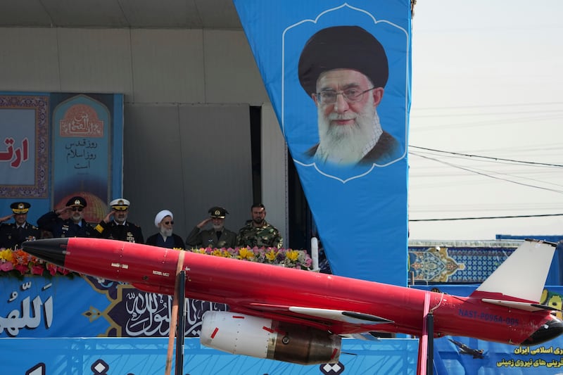 A drone is carried on a truck in front of a portrait of Iranian supreme leader Ayatollah Ali Khamenei in an army parade near Tehran. AP