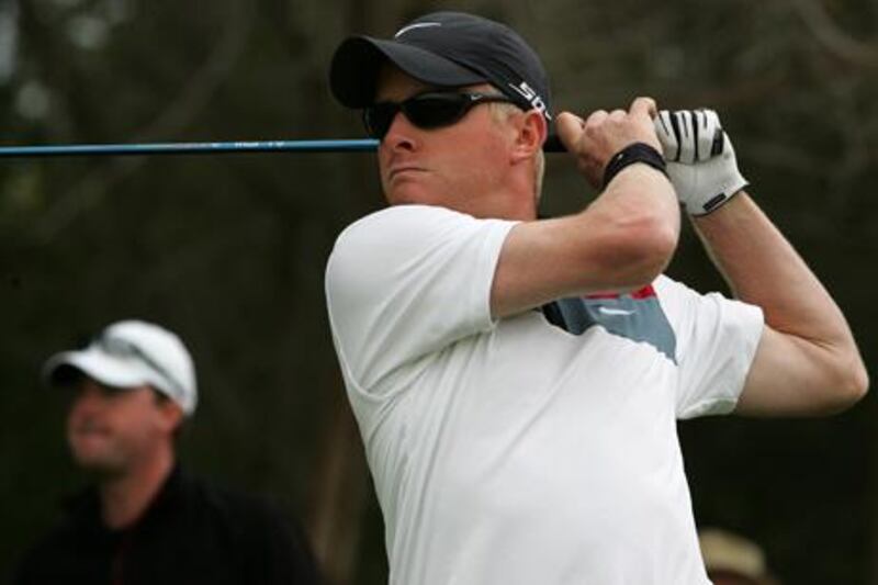 ABU DHABI, UNITED ARAB EMIRATES - JANUARY 19: England's Simon Dyson lets fly off the tee at the Abu Dhabi Golf Championship on January 19 2008 (Photo by Joseph J Capellan / ADMC)