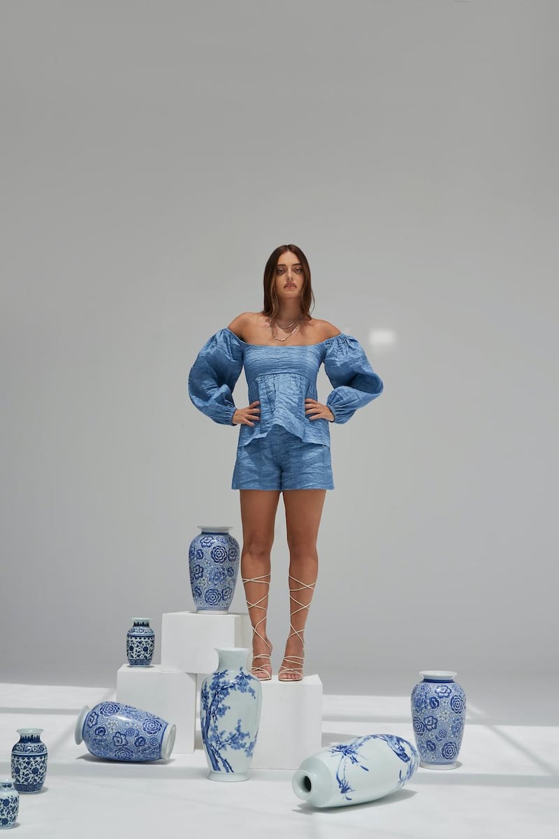 A bandeau top and city shorts in washed denim blue for  the Madiyah Al Sharqi x Karen Wazen spring / summer 2021 collaboration. Courtesy Madiyah Al Sharqi