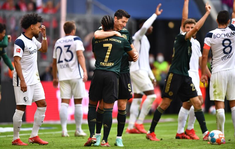 Munich's Robert Lewandowski and Serge Gnabry celebrate. EPA