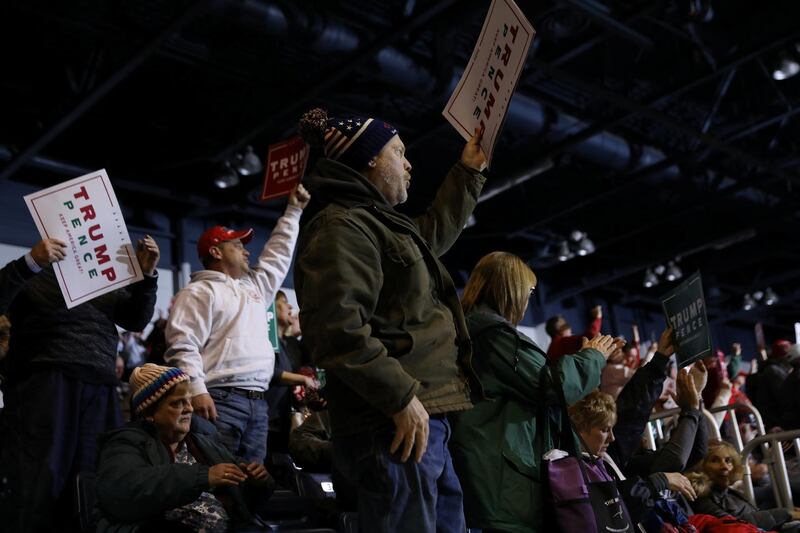 Supporters react at US President Donald Trump's campaign rally in Battle Creek, Michigan, December 18, 2019. Reuters
