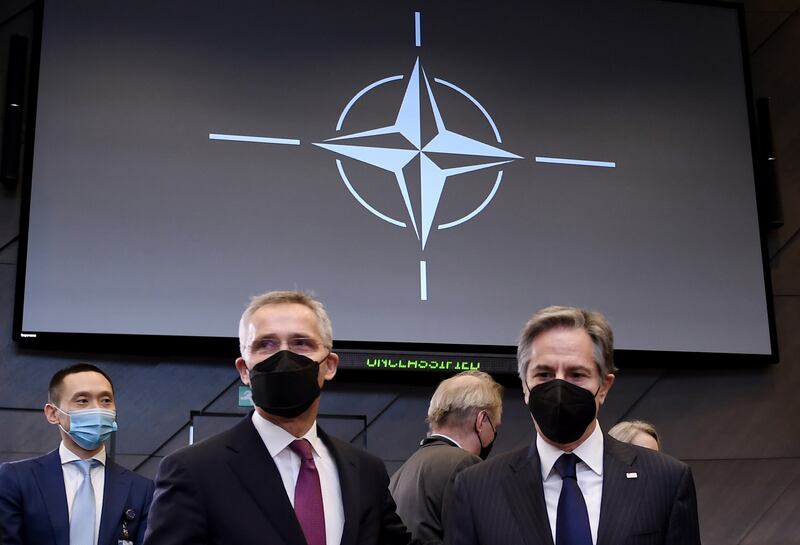 U. S.  Secretary of State Antony Blinken, right, poses with NATO Secretary General Jens Stoltenberg during a an extraordinary NATO foreign ministers meeting at NATO headquarters in Brussels. AP