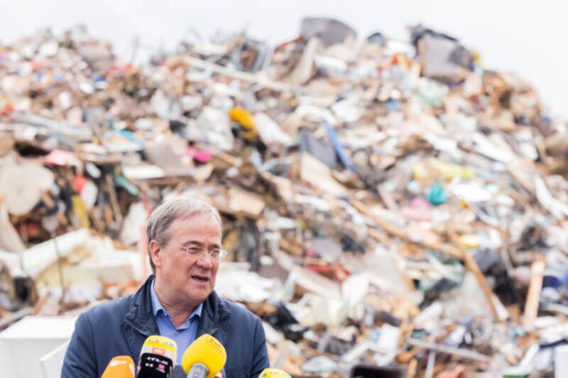 North Rhine-Westphalia Governor Armin Laschet visits a flood site. Locals have accused authorities of failing to sound sirens or issue other warnings on the night of the floods. Getty Images