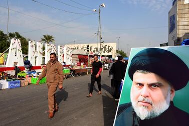 A portrait of cleric Moqtada Al Sadr is displayed in Baghdad on January 3, 2020. EPA