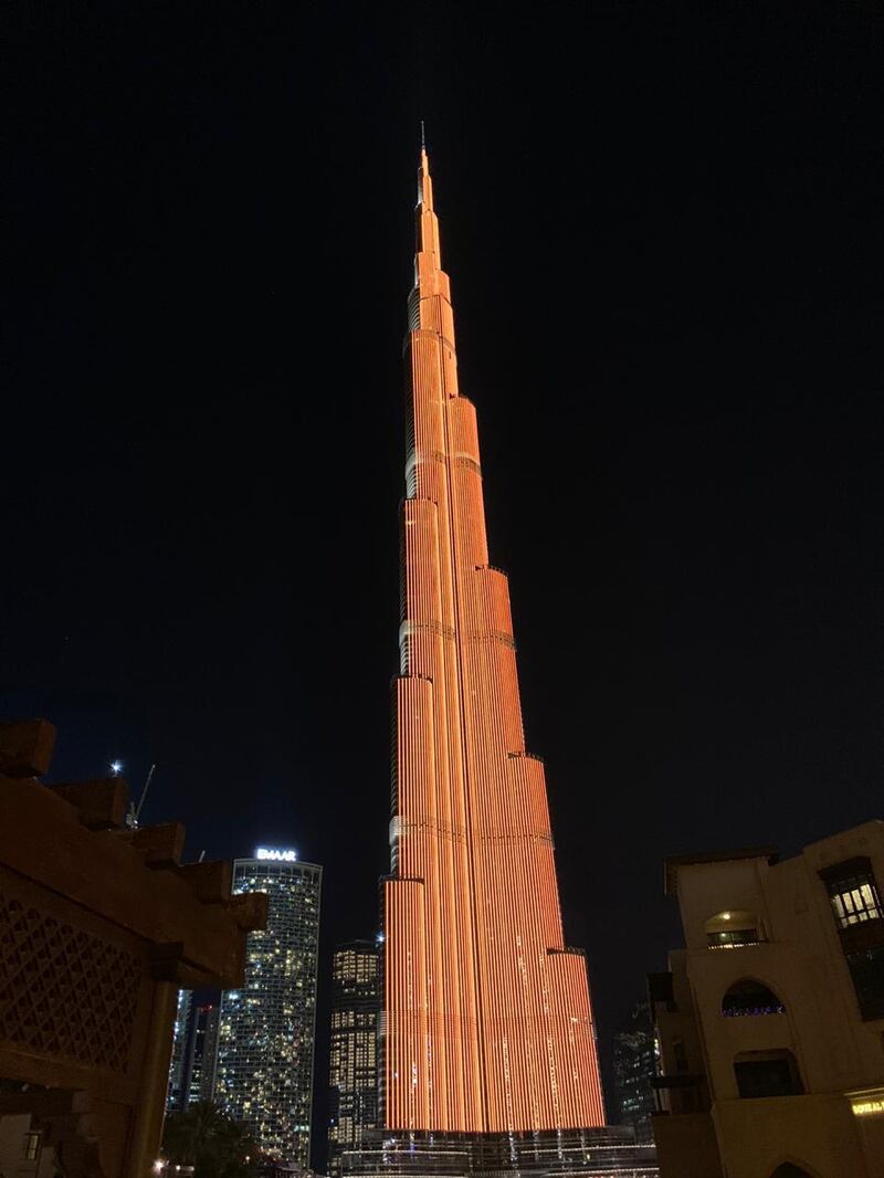 The Burj Khalifa is lit up in orange in solidarity with the United Nations campaign to eliminate violence against women. WAM