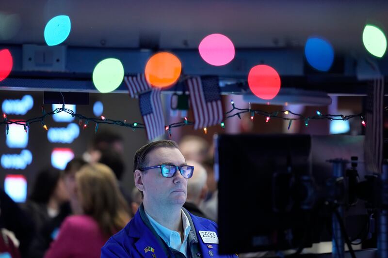 Traders at work on the New York Stock Exchange floor. Major global stock markets ended 2023 with mixed results, but Wall Street posted its best annual rise since 2019. AP