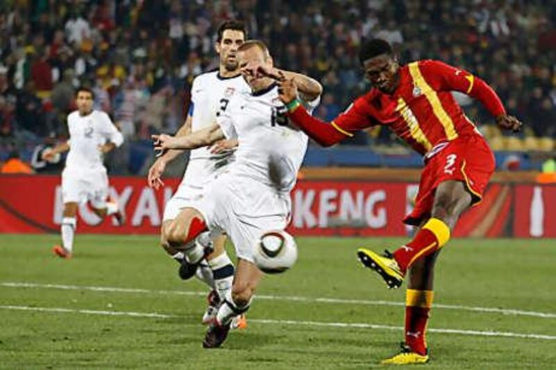 Ghana's Asamoah Gyan, right, insists that he takes the highs and lows of life in his stride.