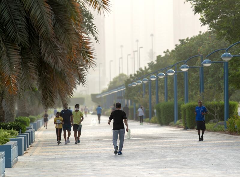 Hazy days: the Corniche in Abu Dhabi. The National