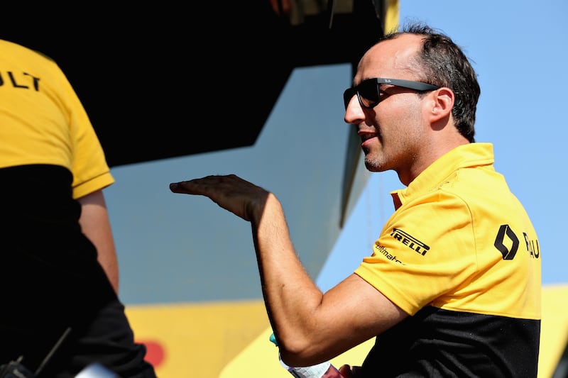 BUDAPEST, HUNGARY - AUGUST 01:  Robert Kubica of Poland and Renault Sport F1 looks on from the pit wall during day one of F1 in-season testing at Hungaroring on August 1, 2017 in Budapest, Hungary.  (Photo by Charles Coates/Getty Images)