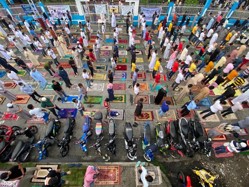 Muslim devotees pray outside a mosque in Taguig city, south of Manila, Philippines. EPA