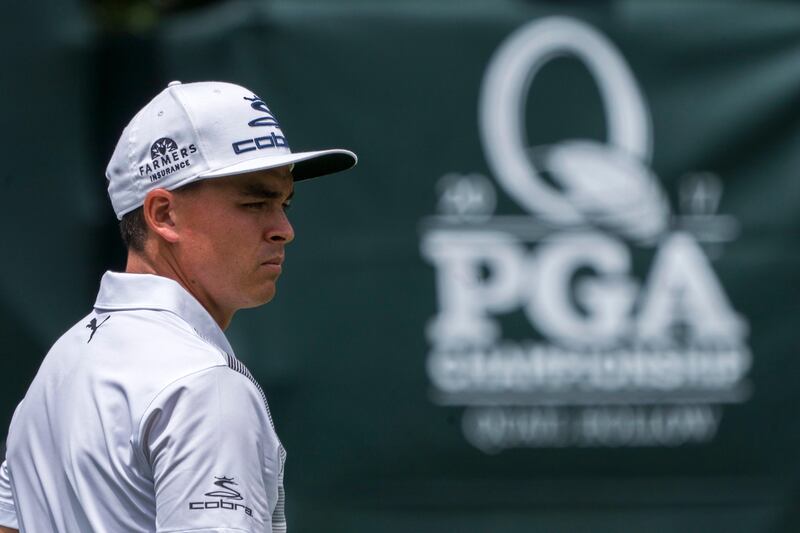 epa06130747 Rickie Fowler of the US walks onto the 6th green during a practice round for the 99th PGA Championship golf tournament at Quail Hollow Club in Charlotte, North Carolina, USA, 07 August 2017.  EPA/SHAWN THEW