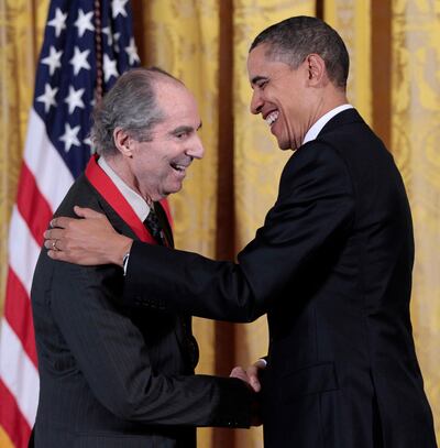FILE - In this March 2, 2011, file photo, President Barack Obama, right, presents a National Humanities Medal to novelist Philip Roth during a ceremony in the East Room of the White House in Washington. Roth, prize-winning novelist and fearless narrator of sex, religion and mortality, has died at age 85, his literary agent said Tuesday, May 22, 2018. (AP Photo/Pablo Martinez Monsivais, file)