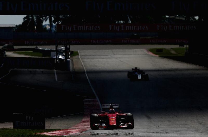 Vettel drives during the Malaysia Grand Prix at Sepang Circuit. Clive Mason / Getty Images