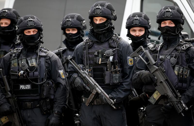 A special federal police unit stands during a visit by German interior minister Thomas de Maiziere (not pictured) at the fair halls of the G20 summit site in Hamburg, northern Germany on July 4, 2017. Friedemann Vogel/EPA