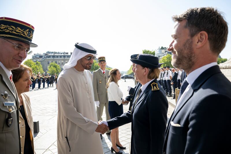 The UAE President greets a members of the Unknown Soldier’s Torch Committee. Photo: Presidential Court
