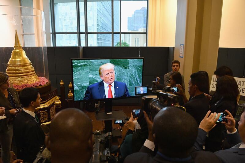 Members of the media inside the UN watch a television broadcasting US President Donald Trump's address  General Debate of the General Assembly of the United Nations at United Nations Headquarters.  EPA