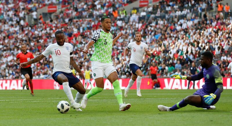 Soccer Football - International Friendly - England vs Nigeria - Wembley Stadium, London, Britain - June 2, 2018   England's Raheem Sterling in action with Nigeria's William Troost-Ekong                Action Images via Reuters/Carl Recine