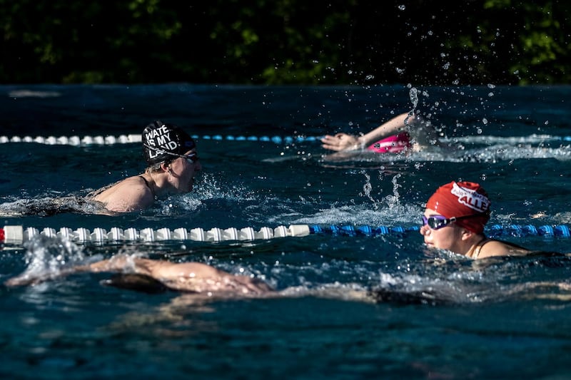 Swimmers exercise in an open air pool in Berlin, Germany. Authorities are easing lockdown measures across Germany. Getty Images