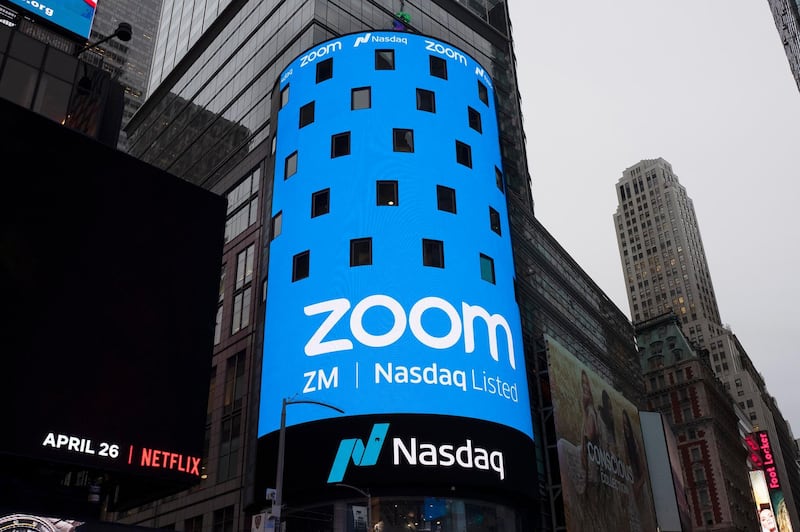 FILE - This April 18, 2019, file photo shows a sign for Zoom Video Communications ahead Nasdaq IPO in New York. 
Video app company Zoom said Thursday, June 11 2020, it regretted that some meetings involving U.S.-based Chinese dissidents were disrupted, as meanwhile a prominent Hong Kong activist said his account was blocked despite the cityâ€™s guarantees of free speech. (AP Photo/Mark Lennihan, File)