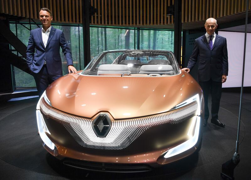 Thierry Bollor, right,  vice-president of Renault and chief designer Laurens van den Acker present the  Renault Symbioz concept. Arne Dedert / dpa via AP