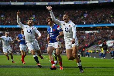 Jonny May, right, scored three tries for England against France. Getty