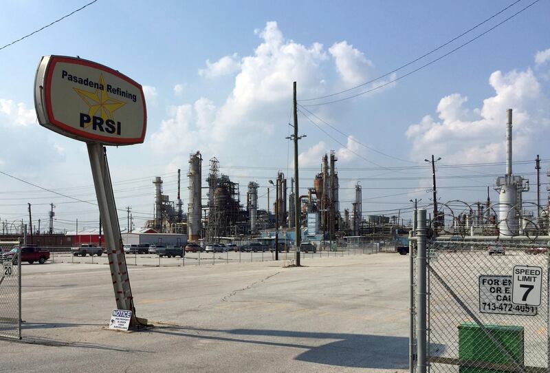 This Sept. 2, 2017, photo shows the Petrobras oil refinery plant in Pasadena, Texas. Plants owned by Shell, Chevron, Exxon-Mobil and other industry giants reported more than 1.5 million pounds (680 metric tons) of extraordinary emissions over eight days beginning Aug. 23, to the Texas Commission of Environmental Quality in Harris County, which encompasses Houston. Petrochemical corridor residents say air that is bad enough on normal days got unbearable as Hurricane Harvey crashed into the nation's fourth-largest city and then yielded the highest ozone pollution of the year anywhere in Texas. (AP Photo/Frank Bajak)