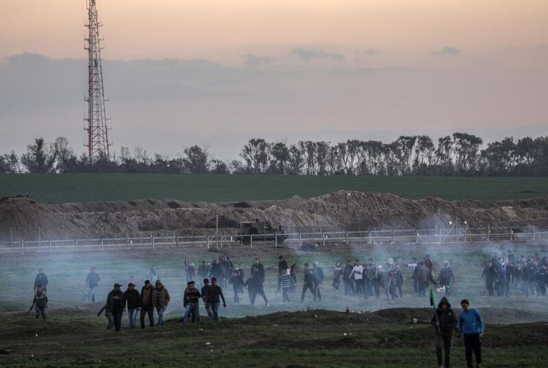 An Israeli jeep drives along the border during protests in the east Gaza Strip.  EPA