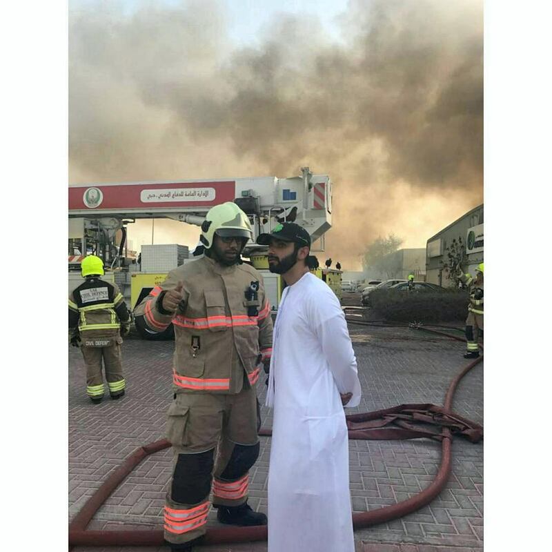Sheikh Mansour bin Mohammed visits the site to oversee firefighting operations. Courtesy Dubai Civil Defence