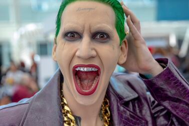 Matthew Morningstar from Tucson, Ariz, poses as the "Joker" on Day one at Comic-Con International (Photo by Christy Radecic/Invision/AP)
