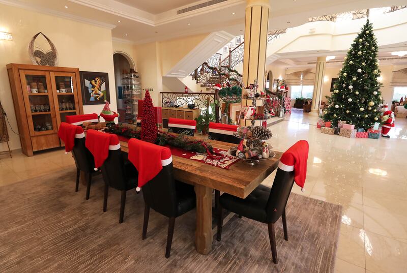 The Palmers have a Santa Claus-themed dining table. Photo: Pawan Singh / The National
