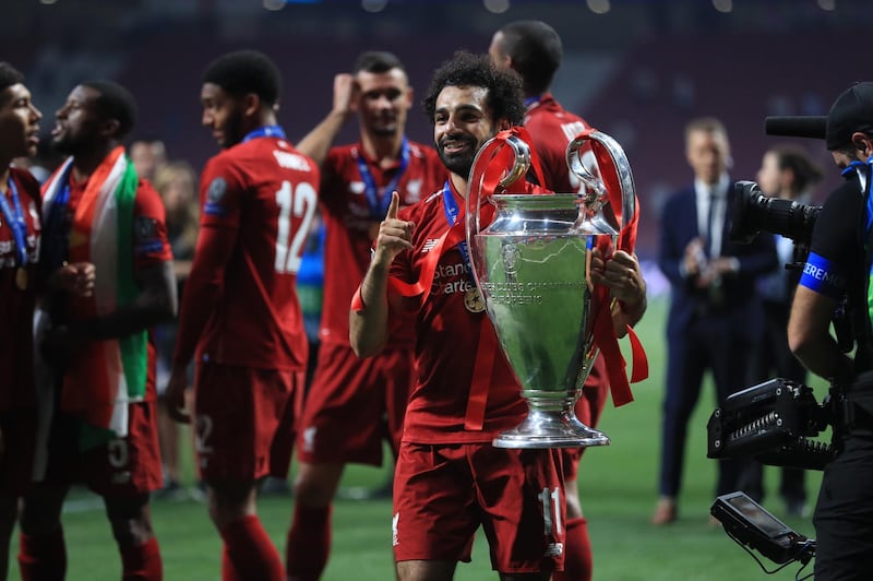 Liverpool's Mohamed Salah celebrates victory after winning the UEFA Champions League Final. PA
