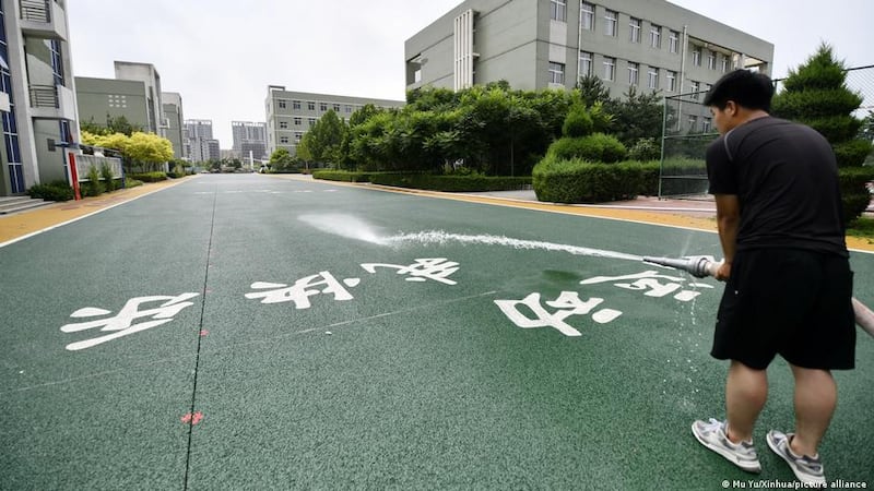 Permeable surfaces like this one allow water to seep below the street and disperse. Photo: Xinhua News Agency