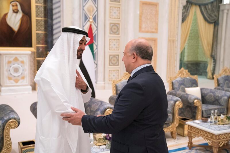 ABU DHABI, UNITED ARAB EMIRATES - May 20, 2018: HH Sheikh Mohamed bin Zayed Al Nahyan Crown Prince of Abu Dhabi Deputy Supreme Commander of the UAE Armed Forces (L), receives HE Osama Nafa'a, Ambassador of Hungary to the UAE (R), during an iftar reception at the Presidential Palace. 

( Hamad Al Kaabi / Crown Prince Court - Abu Dhabi )
---