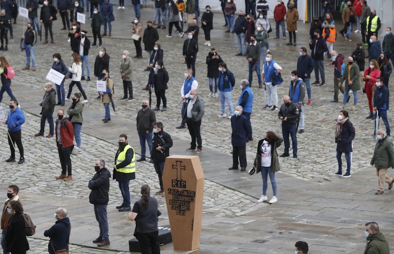 Owners of bars and restaurants in Santiago de Compostela, Spain, protest against the new restrictions imposed to stop the coronavirus spread. EPA