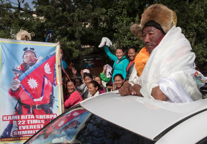 Kami Rita Sherpa is welcomed by Sherpa community at Kathmandu Airport in Kathmandu, Nepal. Narendra Shrestha / EPA