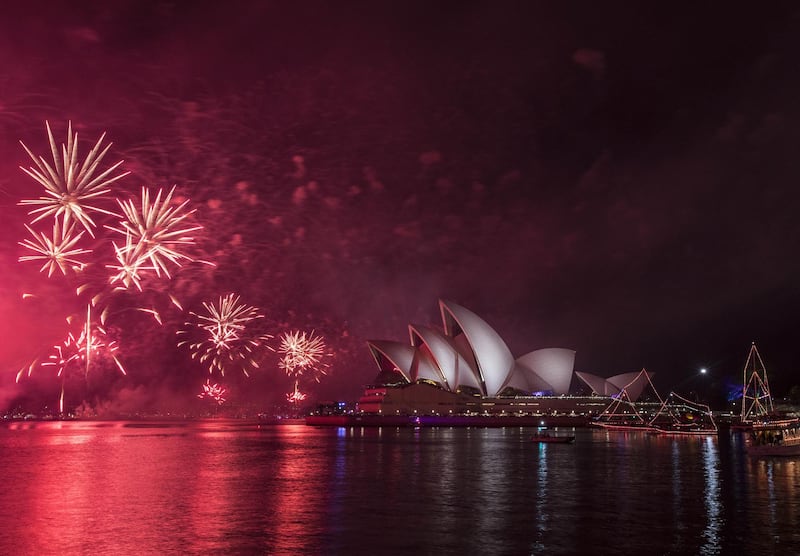 The midnight fireworks light up the Sydney Opera House during New Year's Eve celebrations in Sydney, Australia. Getty Images