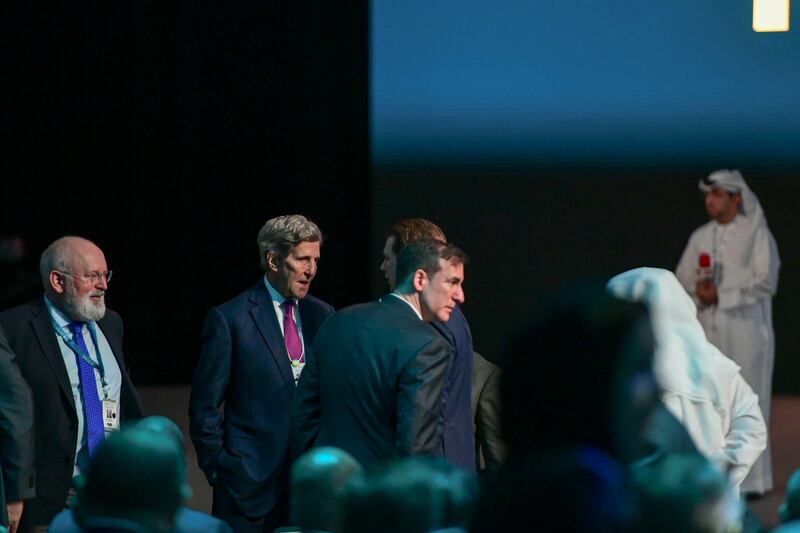 US climate envoy John Kerry, centre. Khushnum Bhandari / The National
