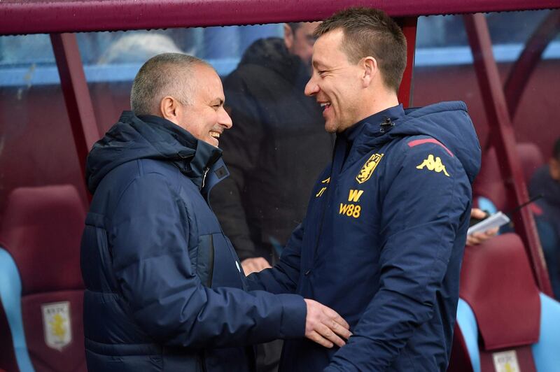 Aston Villa assistant manager John Terry, right, with Jose Mourinho - his old manager at Chelsea - before the game at Villa Park. AFP