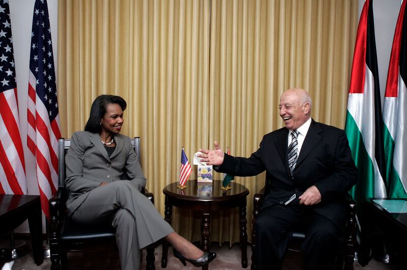 Mr Qurei with Condoleeza Rice in November 2007. Getty