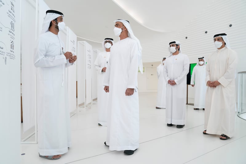 President Sheikh Mohamed, centre, in the UAE pavilion at Expo 2020 Dubai. With him are  Sheikh Mansour bin Zayed, Deputy Prime Minister and Minister of Presidential Affairs, right, Sheikh Maktoum bin Mohammed, Deputy Prime Minister and Minister of Finance, second right, Dr Sultan Al Jaber, Minister of Industry and Advanced Technology, fourth right, and Abdullah Al Marri, Minister of Economy, left.