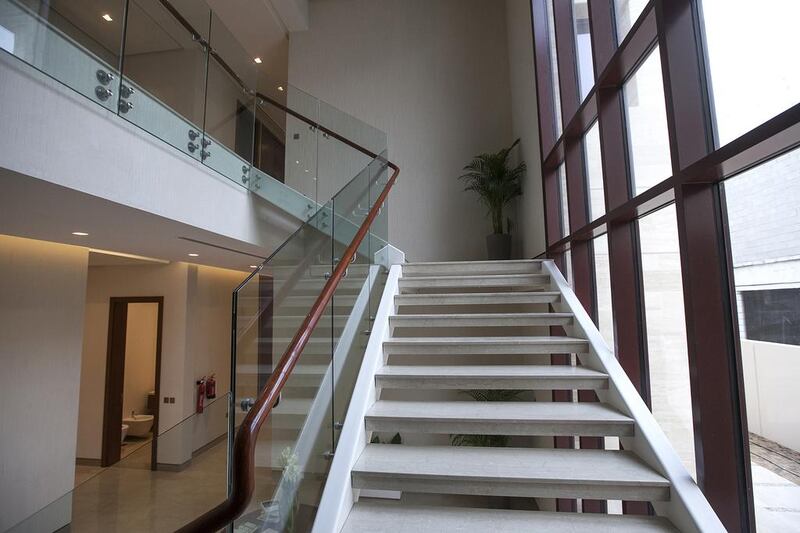 The stairs to first floor of villa type 3C. Mona Al Marzooqi / The National