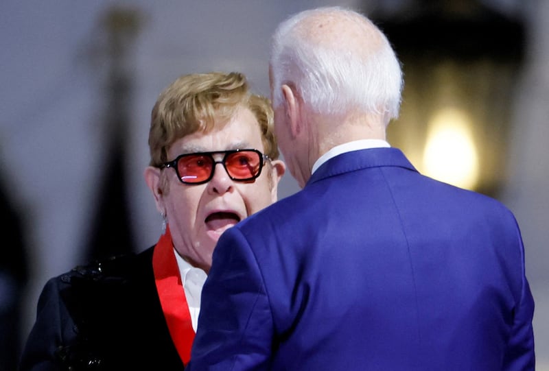 Elton John after accepting the National Humanities Medal from US President Joe Biden. Reuters