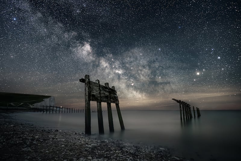 This image captured by Giles Embleton-Smith, called Galactic Bay, won the Starry Skyscapes category of annual South Downs National Park astrophotography competition. PA