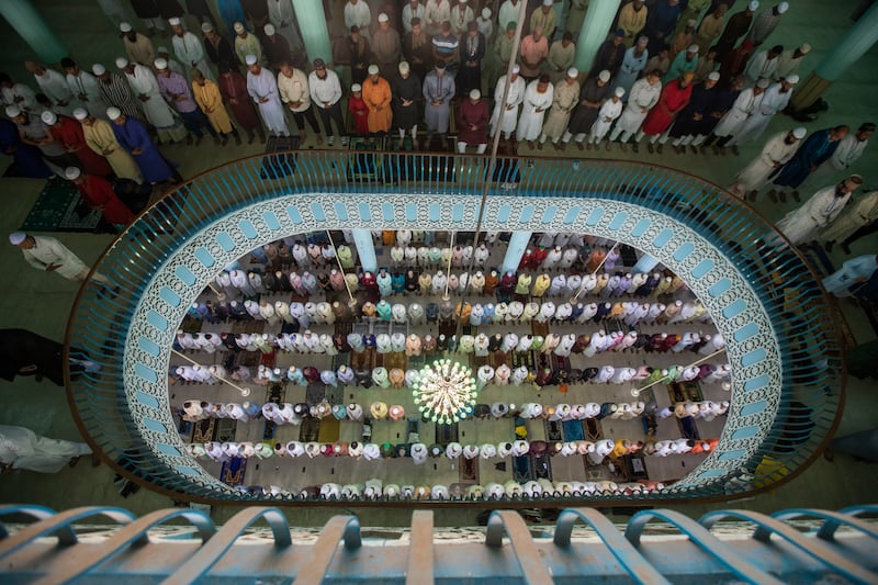 Muslims attend Eid Al Fitr prayers at the Baitul Mukarram National Mosque in Dhaka, Bangladesh. EPA