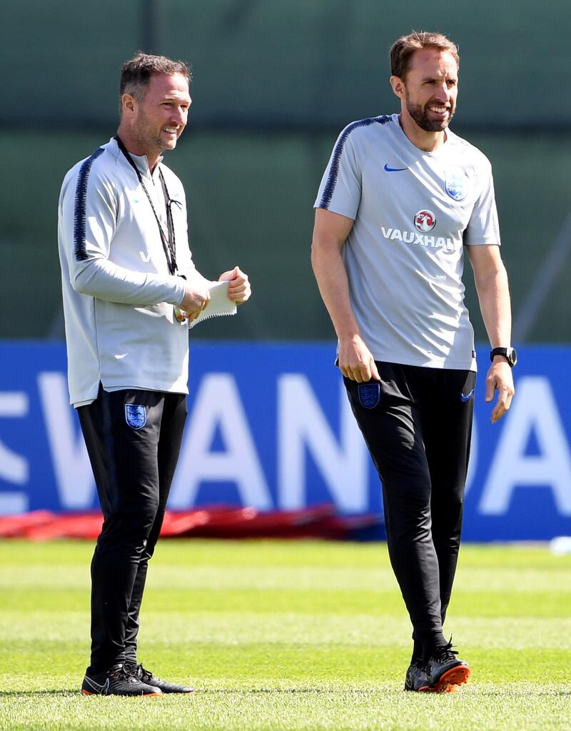 England assistant coach Steve Holland, left, and coach Gareth Southgate take part in a training session in Repino on June 27, 2018. Paul Ellis / AFP