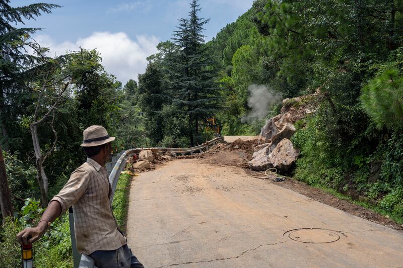 Nearly 750 roads were damaged in landslides and flash floods, state officials said. AP Photo